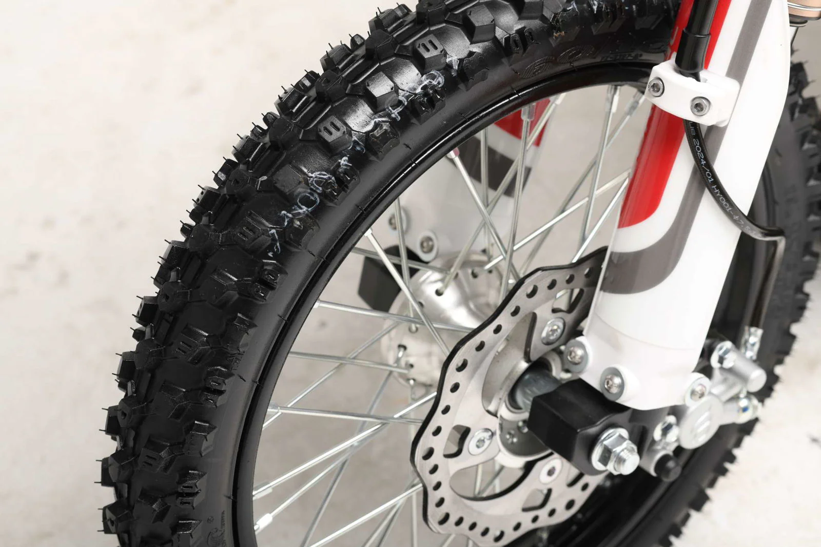 TrailMaster MK125 Dirt Bike 4-Speed Manual Dual Disc Brakes, Electric Start (14/12), Ages 12 and up